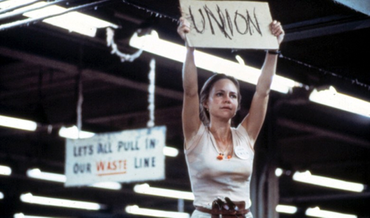 Sally Field as Norma Rae holding a UNION sign